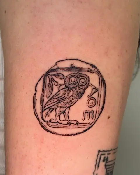  fine line owl tattoo representing godess Athena